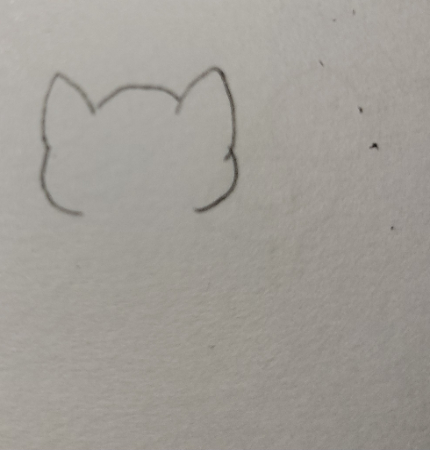 先ほど描いた耳とつなげるように犬の輪郭を描きます。